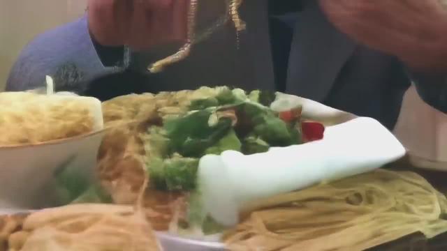 Joe Biden and Trump Eating Spaghetti, but it's an AI generated nightmare