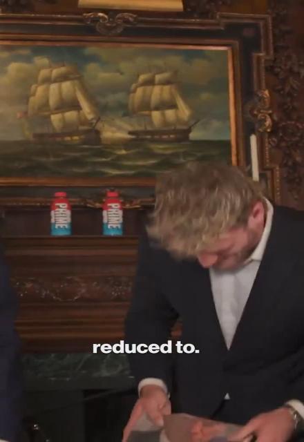 Donald Trump meets Logan Paul and gifts him mugshot t-shirt.