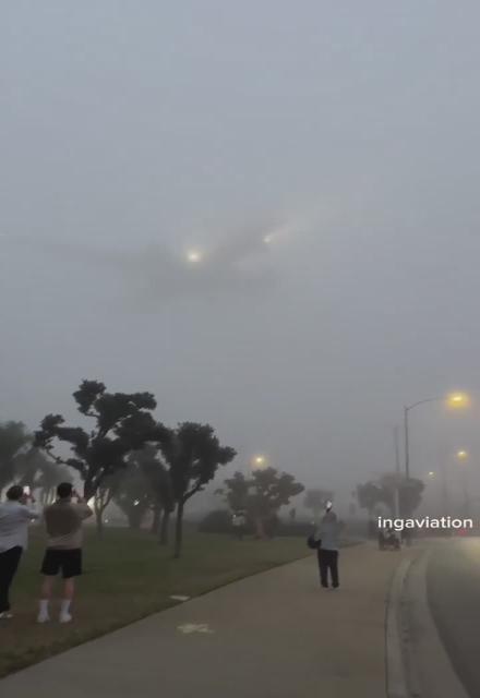 Los Angeles resident says “I would’ve never imagined it would get this foggy in LA”  It’s so foggy the planes seem to come out of nowhere. This was filmed at the ‘airplane landing viewpoint in Los Angeles’. It’s pretty incredible pilots are able to land safely through this fog