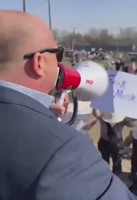BREAKING 🚨 Alex Jones just drove up to a TESLA Dealership in his Cybertruck to confront protestors right to their face  Alex Jones is Fearless 🔥