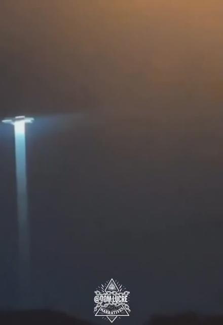 BREAKING NEWS: An entire urban neighborhood is reporting that they are witnessing a UFO in 4k as a massive light can be seen beaming down from a flying saucer.