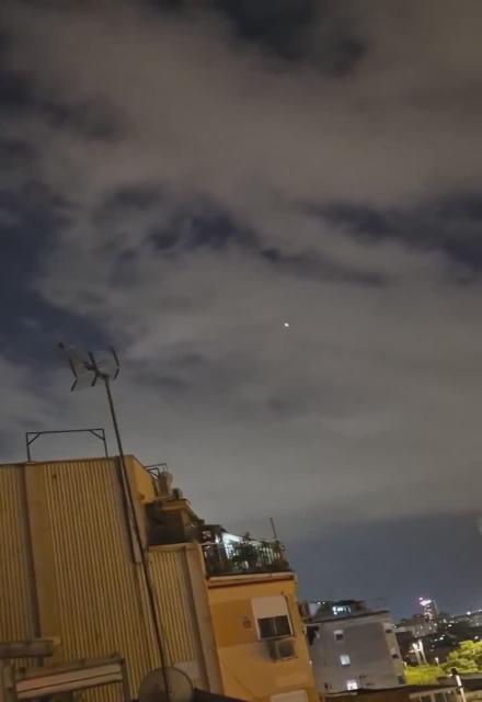 Meanwhile over Barcelona, Spain  The same orbs that are becoming a daily observation fly over the Spanish City in huge numbers