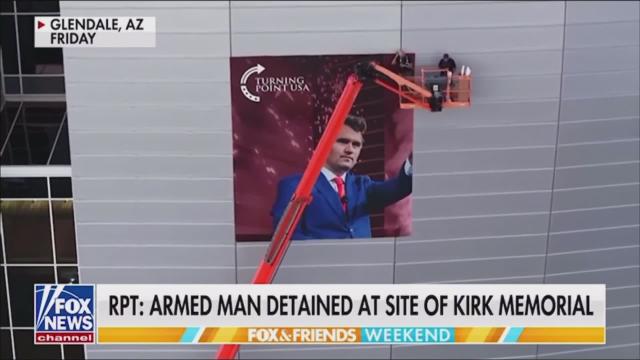 NEW — An armed man is now in custody after entering the Charlie Kirk memorial site posing as a law enforcement officer