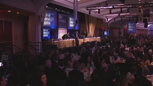 BREAKING FOOTAGE AS TRUMP IS RUSHED FROM THE STAGE - BREAKING: Loud sounds reported inside the White House Correspondents' Dinner.   Trump and Melania removed by Secret Service.  -Agents visibly alarmed during evacuation